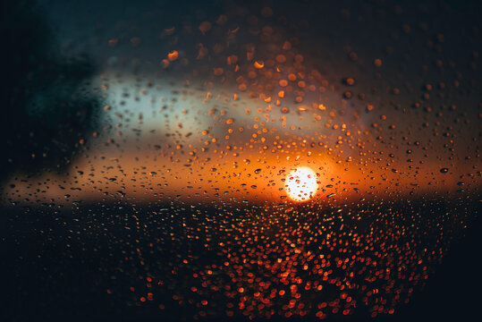 water drops on the glass at sunset