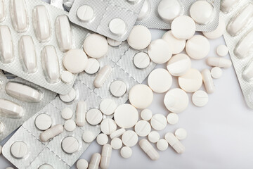 Fototapeta na wymiar Pile of pills and other drugs closeup. High quality photo