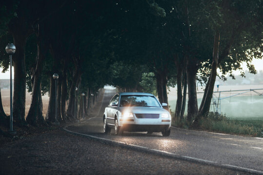 car on the road in a storm