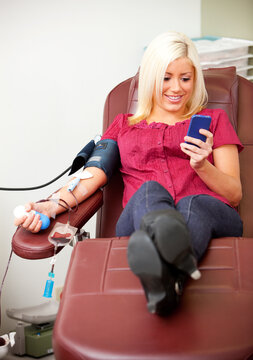 Blood Bank: Woman Uses Cell Phone While Donating Blood