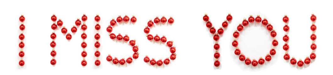 Red Christmas Ball Ornament Building English Word I Miss You. Festive Christmas Decoration. White Isolated Background