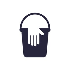 Washing gloves on bucket of water