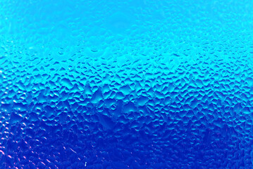 Texture of Water Droplets on Chilled Drink Glass in Blue Color Gradation