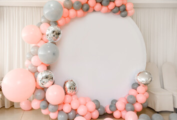 Close up the photo zone from pink and grey balloons with white copy space for your text.