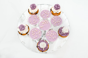 sweet cakes beautiful arranged on the white table