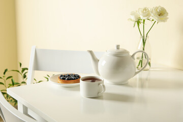 Concept of breakfast with blueberry pie on white table