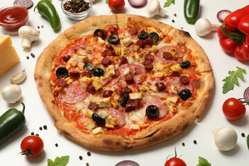 Pizza with meat and ingredients on white background