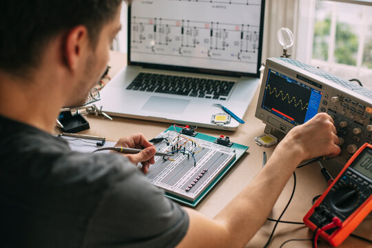 Engineer Testing Electronic Equipment