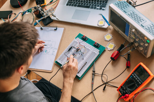 Student Testing Electronic Equipment