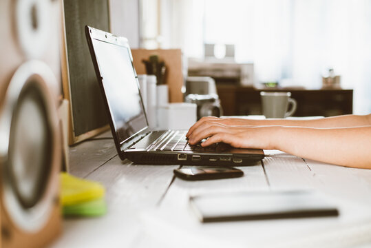 Close Up Of Anonymous Person Typing On Laptop