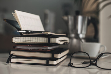 Stack of notebooks on a office.