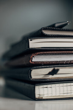 Stack of notebooks on a office.
