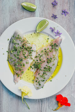 Food: Raw seam bream filet in lemon balm marinade