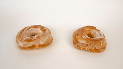 Two custard cakes. Baking on a white background, delicious sweets.