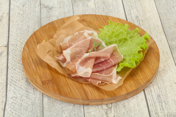 Italian prosciutto pork meat over board