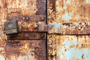 Old door with an old lock. Old padlock.