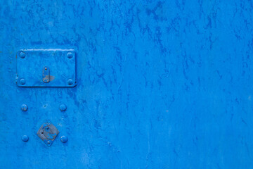 Old door with an old lock. Old padlock.