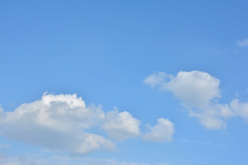 Fototapeta premium Blue Sky With Scattered Clouds With A Sun 