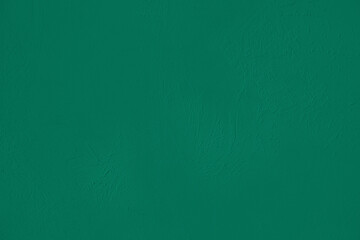 Dark green low contrast soft Concrete textured background to your concept or product. Natural color trend.