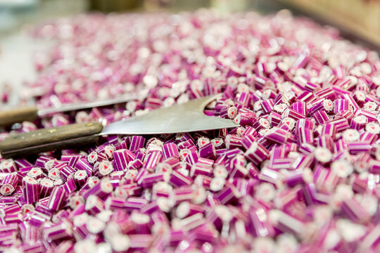 Hard candy pieces cut to size and awaiting bagging