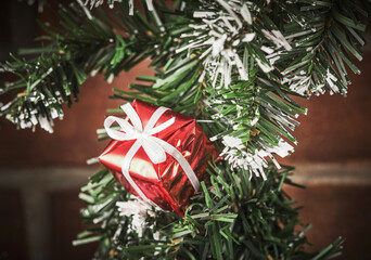 Christmas decoration on brick wall background.