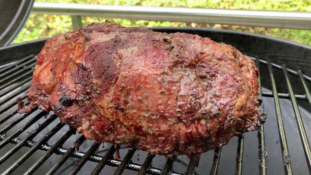 Liestal, Switzerland - September 22, 2020: A large piece of roast pork on the grill