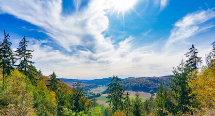 View of the valley in the Kellerwald-Edersee National Park, in Germany, on a sunny autumn day - obrazy, fototapety, plakaty