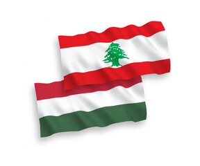 Flags of Lebanon and Hungary on a white background