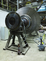 Power generator steam turbine in repair process, machinery, pipes, tubes at power plant