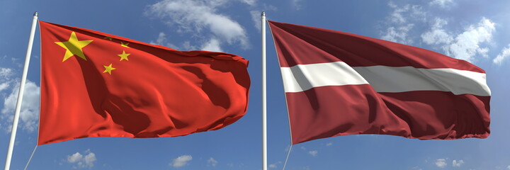 Flying flags of China and Latvia on high flagpoles. 3d rendering