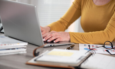 Businesswoman working on laptop