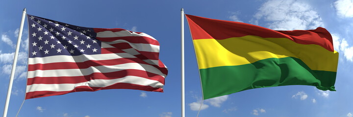 Flying flags of the United States and Bolivia on sky background, 3d rendering