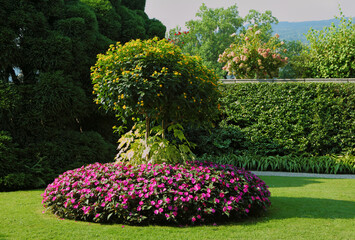 A masterpiece of landscape art.The flower beds