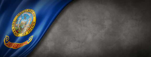 Idaho flag on concrete wall banner, USA