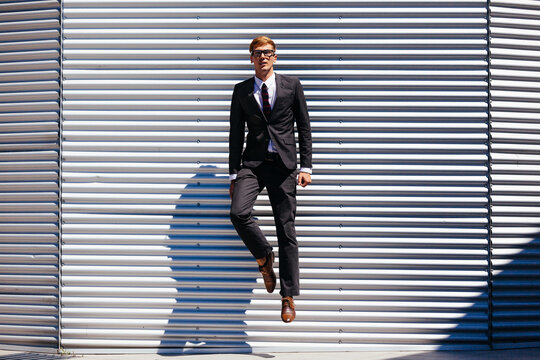Businessman Hanging In The Air