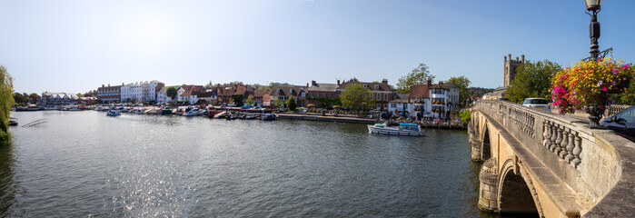 View from the bridge over the River Thames at Henley in Oxfordshire, England. Wide panoramic landscape