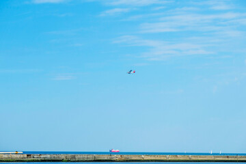 small propeller plane against blue sky