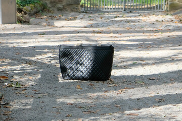 single handbag in the park
