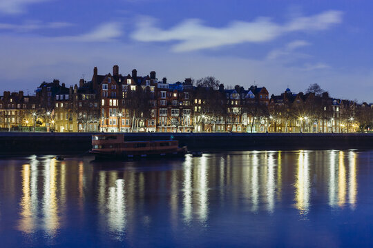 Terraced Houses Along Thames River in London, Twilight