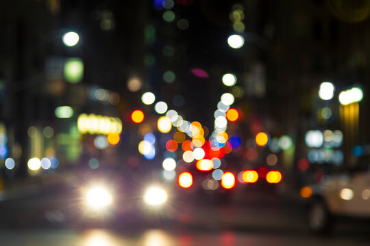 Late Night Traffic in a Big City as Lens Bokeh