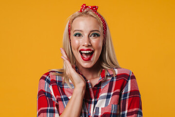 Image of excited blonde pinup girl expressing surprise at camera