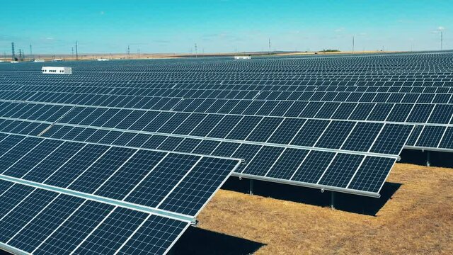 Modern solar panels, ecological friendly energy production. Lines of batteries at the solar electric plant