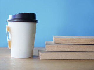 Paper coffee cup in coffee shop.
