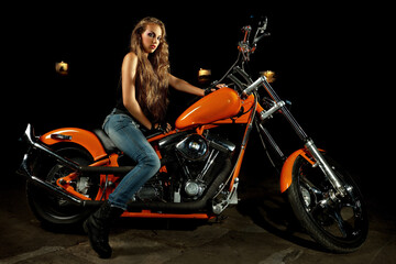 Plakat Sexy young woman in bar in night disco club with motorcycle
