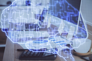 Multi exposure of work space with computer and human brain hologram. Brainstorm concept.