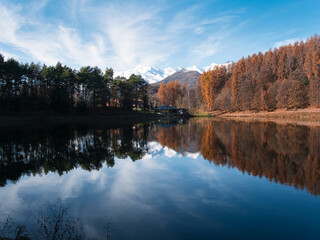 The Meugliano lake in autumn, Alps, Italy.