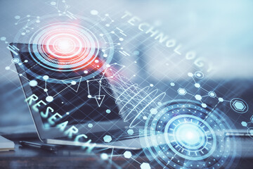 Double exposure of desktop computer and technology theme hologram. Concept of software development.
