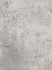 old and white concrete wall with which paint peels off