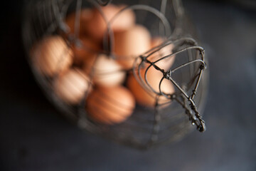 farm fresh brown eggs in wire basket