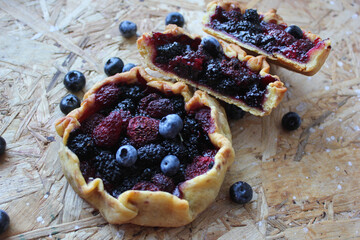 blueberry pie on a wooden board